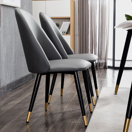 Le alte sedie di lusso della sala da pranzo del cuoio posteriore con le gambe del metallo progettano