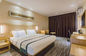 Insieme di camera da letto moderno professionale dell'hotel, mobilia commerciale della camera da letto