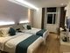 La mobilia della camera da letto della stanza/hotel di ospite mette il legno solido alla moda materiale